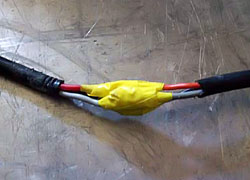 unfachmännisch "reparierte" Elektroleitung